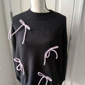 RSQ NWT Soft Black Sweater with Light Purple Bow Accents